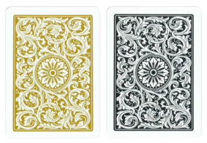 Cartas Copag 1546 con diseño trasero en colores dorado y negro, patrones decorativos clásicos.